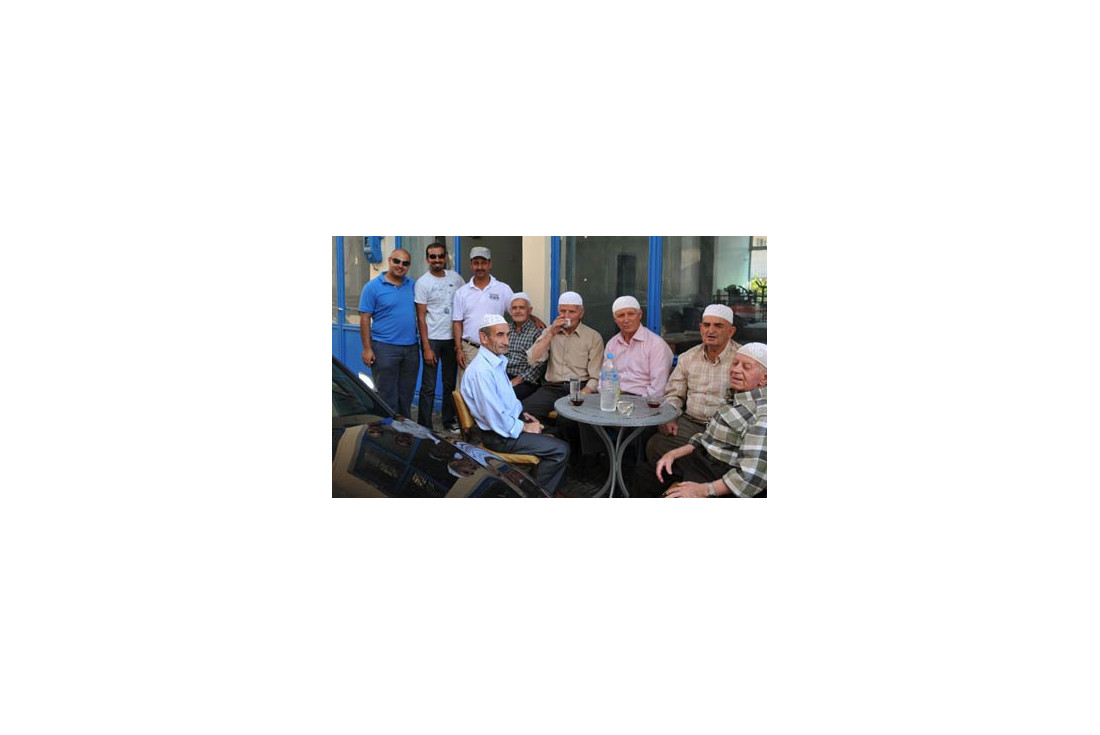 Greek muslim men having afternoon tea in Krios