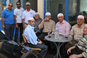 Greek muslim men having afternoon tea in Krios