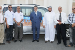 The team with Ambassador Sarra at the start of the tour